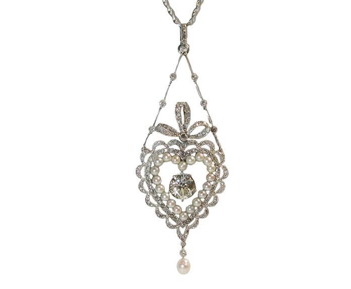 Heart-shaped natural pearl and diamond lavaliere in platinum from Stephen Russell.