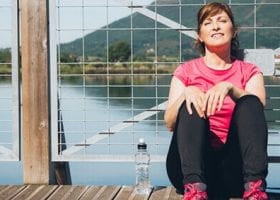 exercise hating girl's guide to adopting a walking program _woman on bridge